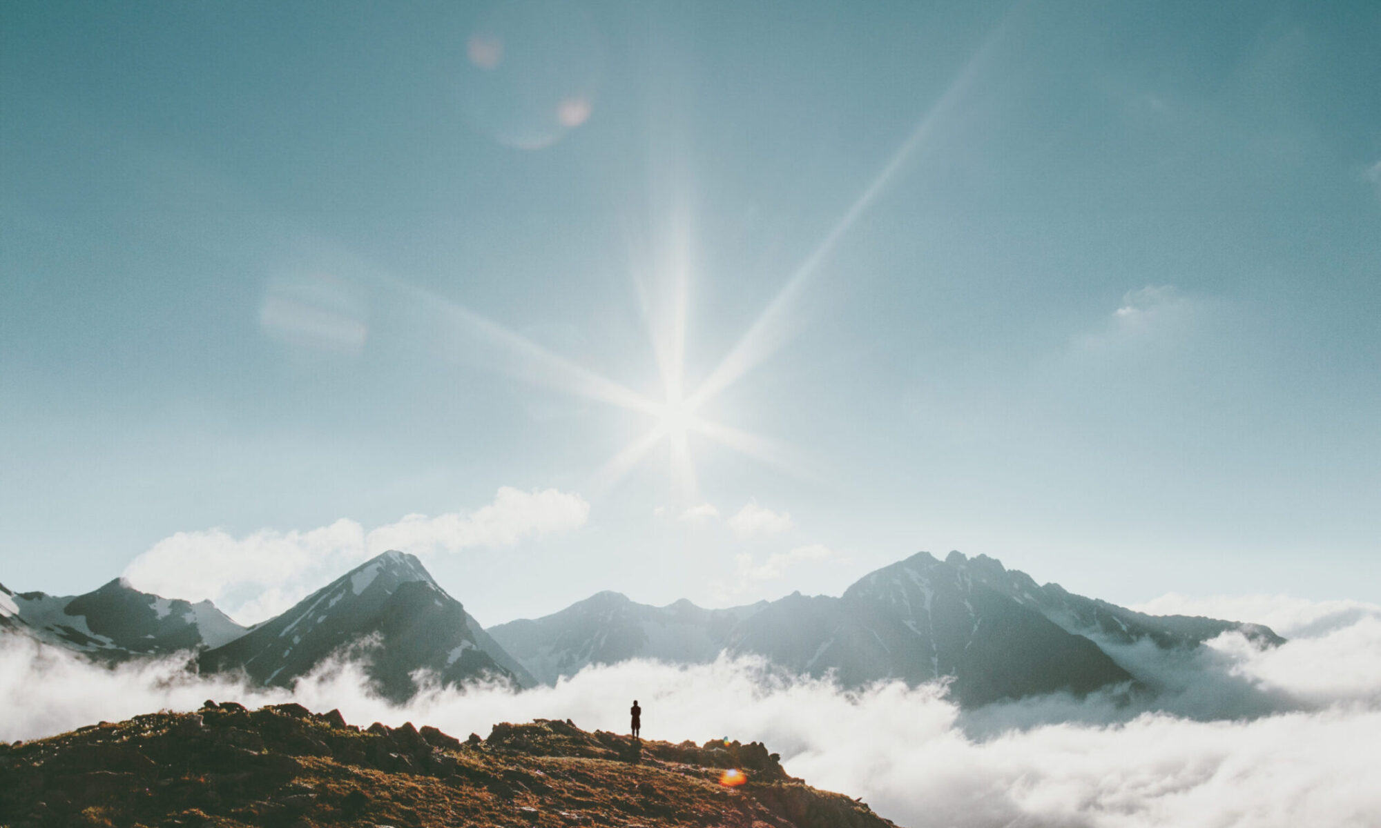 Mountains landscape Travel lifestyle adventure concept traveler standing alone summer vacations outdoor sunny day